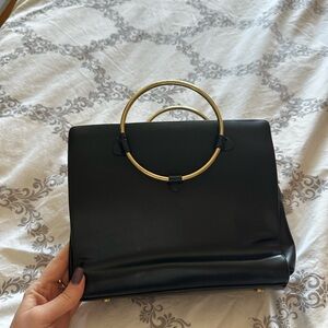 Elegant Black Handbag with Gold Accents